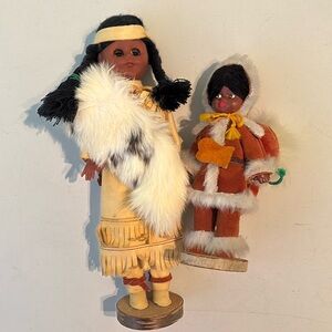 Vintage indian indigenous doll set with baby and fur on stands dark skin